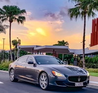 Maserati Quattroporte Limousine Transfer Cairns Airport to City - 2032 Olympic Games