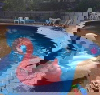 The Coachman Motel  Units - 2032 Olympic Games