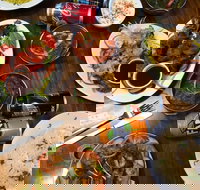 50 Spices Indian Cuisine - 2032 Olympic Games