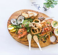 Pavement Restaurant at Lufra Hotel and Apartments - 2032 Olympic Games